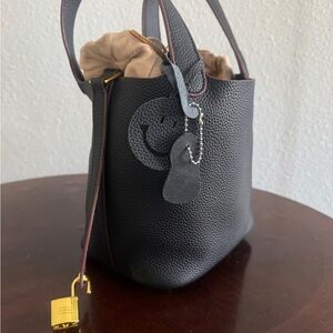 Elegant Black and Brown Leather Totes with Minimalist Design